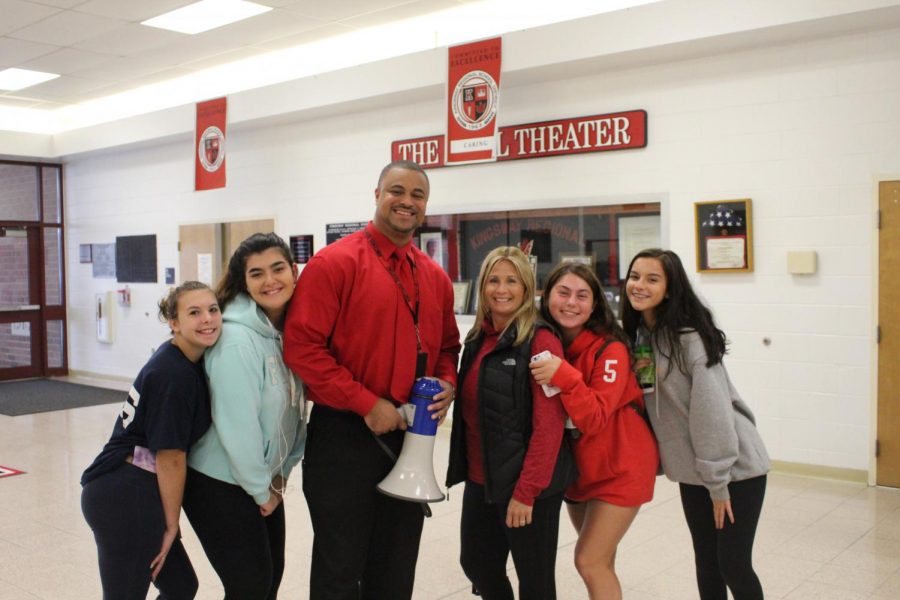 Principal Allen prepares to go out for Bullhorn Friday.