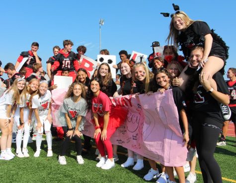 The team shows the spirit of a winner at the fall pep rally